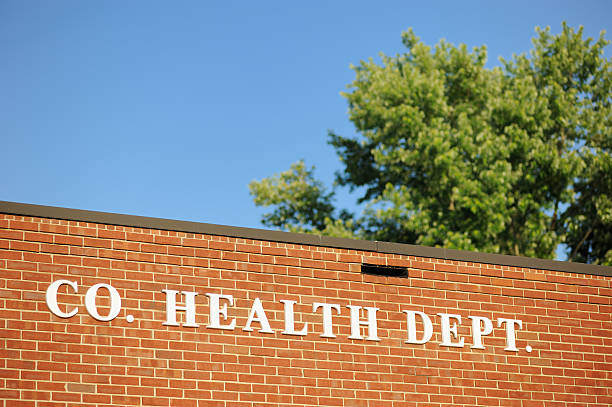 County health department sign health center County health department government programs sign on building exterior. Health Departments stock pictures, royalty-free photos & images