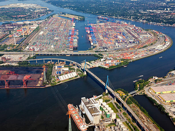 Container terminal at the Port of Hamburg, aerial view Aerial view of container terminal at Hamburg Harbor with Köhlbrand bridge in foreground köhlbrandbrücke stock pictures, royalty-free photos & images
