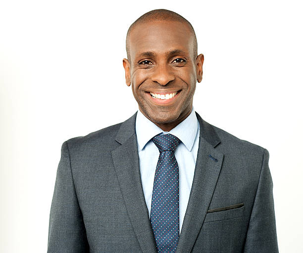 istock Smiling relaxed corporate man posing 507985943