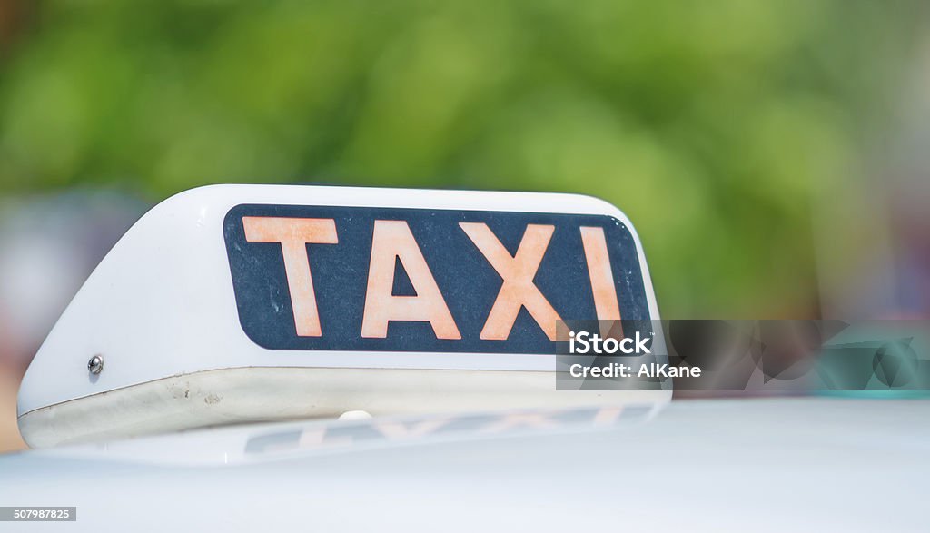taxi sign close up of a taxi sign on blurred background Business Stock Photo
