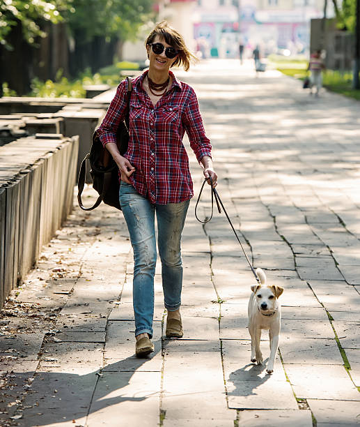 istock woman and dog 507987899