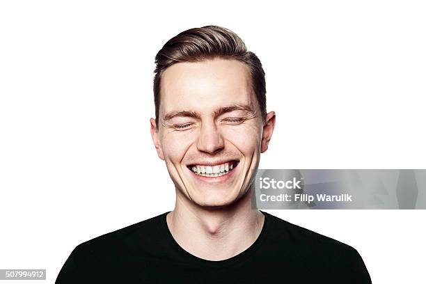 Foto de Retrato De Jovem Homem Sorrindo Para A Câmera e mais fotos de stock de Homens - Homens, Rindo, Sorrindo