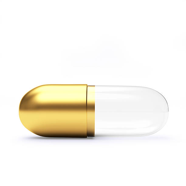 istock Golden transparent medical capsule 507998296