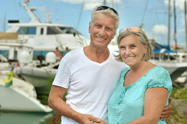 istock senior couple on the pier 507998484