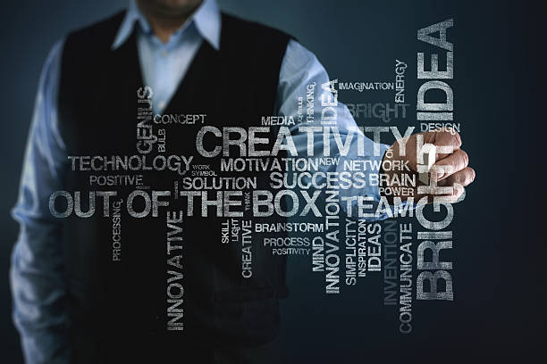 istock Businessman Writing Inspiring Word Cloud on Blackboard 508000586