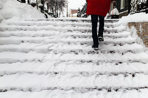 woman climbs the stairs