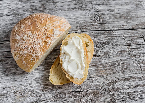 istock Homemade rustic bread on light wooden board 508002890