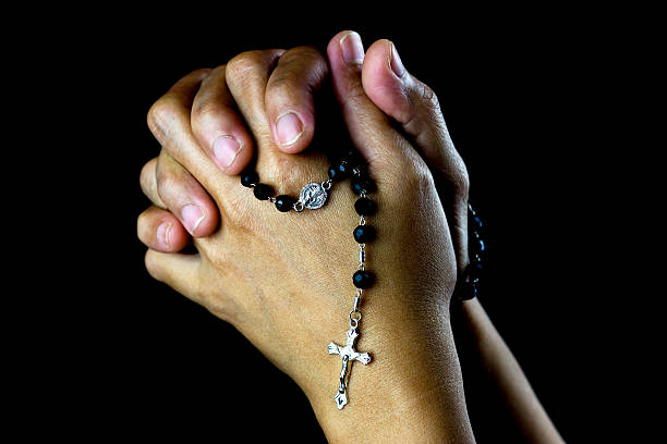 istock Asian Praying Hands With Silver Rosary 508003512