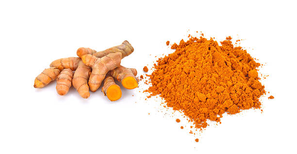 istock turmeric powder with turmeric root isolated on white 508004640