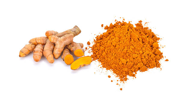 istock turmeric roots and turmeric powder on white background 508006448
