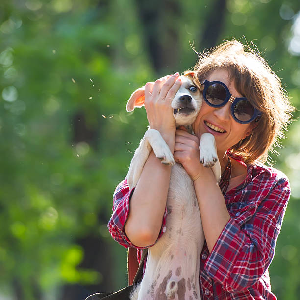istock woman and dog 508009333