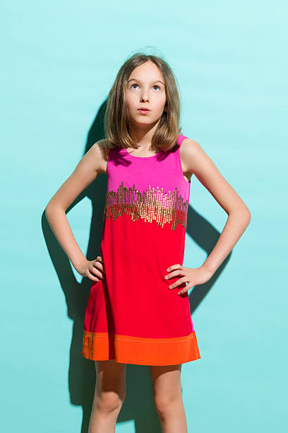 istock Surprised little girl looking up 508009579