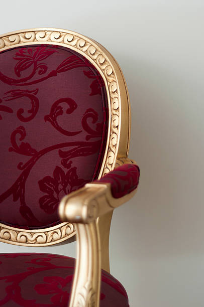 istock One antique gold and red chair 508010143