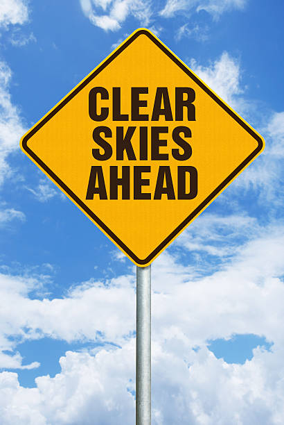 istock Clear Skies Ahead  - Warning Sign Against Sky with Clouds 508010515