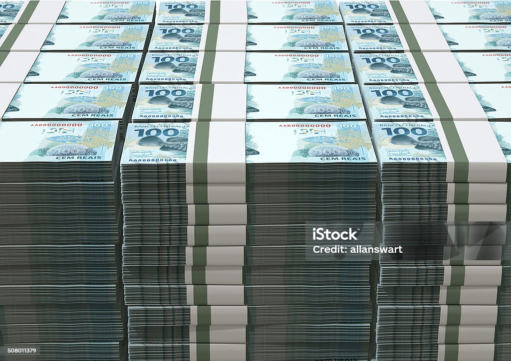 Brazilian Real Banknotes Pile A pile of wads of brazilian real banknotes on an isolated background American One Hundred Dollar Bill Stock Photo