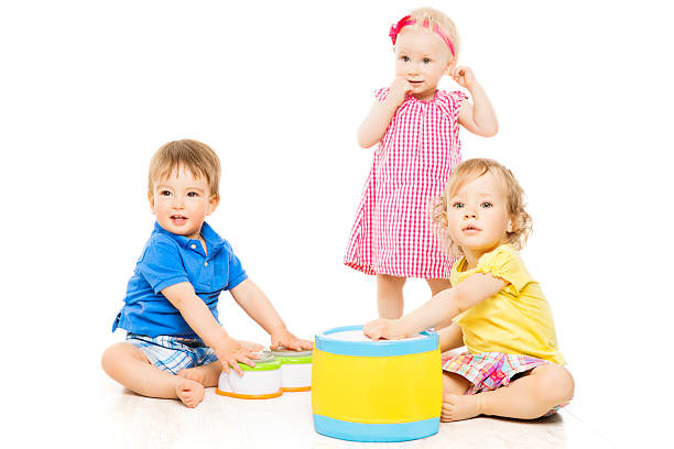 istock Children playing toys. Small Kids over white background 508011865