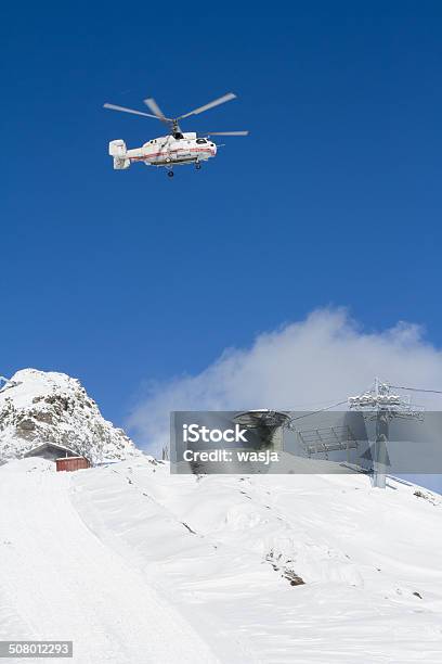 Ski Resort In The Mountains Stock Photo - Download Image Now - Heli-Skiing, Helicopter, Snowboarding