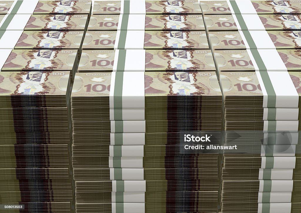 Canadian Dollar Notes Bundles Stack A stack of bundled Canadian Dollar banknotes on an isolated background Currency Stock Photo