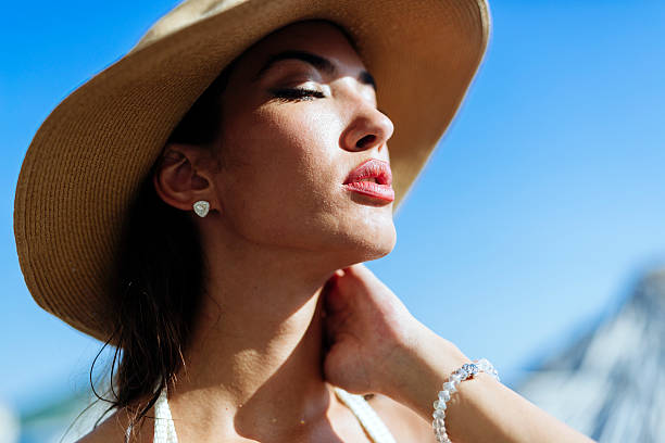 istock Glamorous woman looking towards the sun 508025136