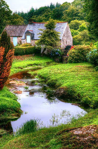 Mill Near Bonen, Brittany Mill near Bonen, Brittany guingamp brittany stock pictures, royalty-free photos & images