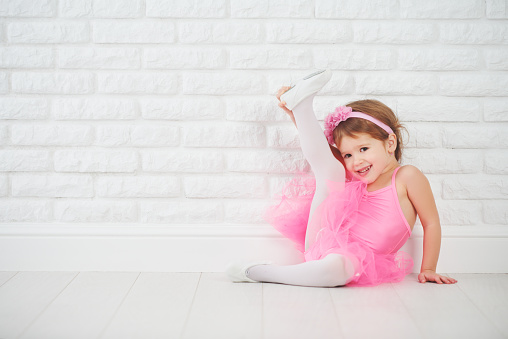 child little girl dancer ballet ballerina stretching