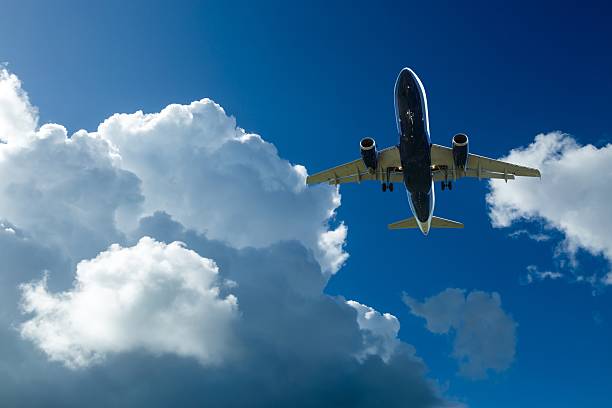 istock sky and clouds seen from an airplane window 508028374