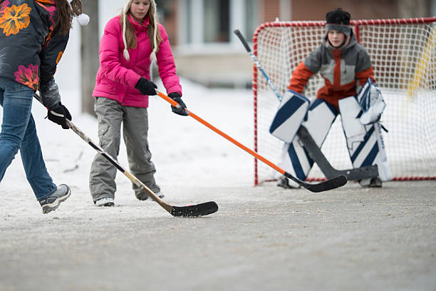 istock Happily Playing Hockey on the Street 508029094