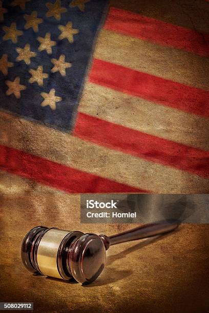 Gavel On A Background Of The American Flag Stock Photo - Download Image Now - American Flag, Gavel, Acquittal