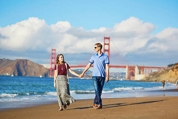 istock Romantic loving couple on Baker beach in San Francisco 508029250