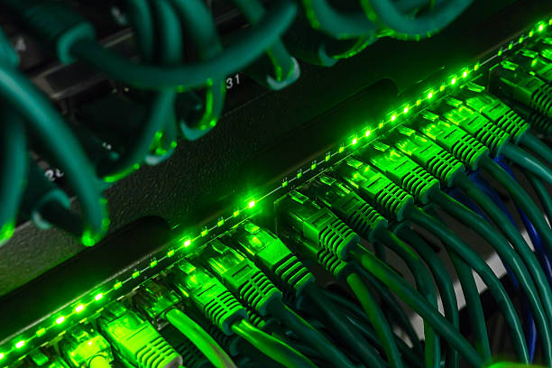 Close up of cables connected to switch glowing