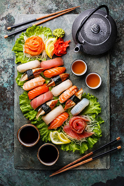 istock Sushi Set nigiri and sashimi with tea 508032608