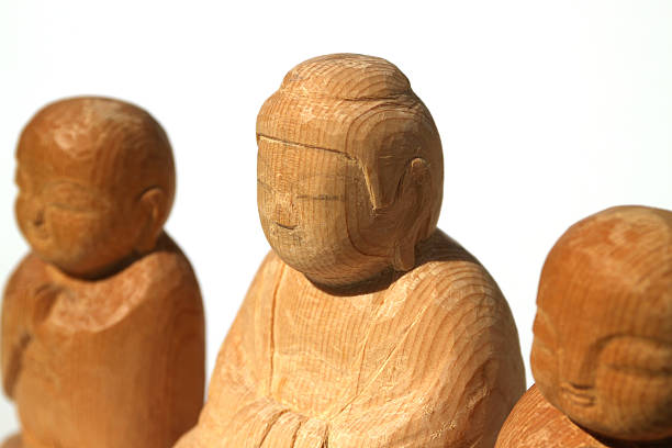 wooden Buddha statue and Ksitigarbha in the white