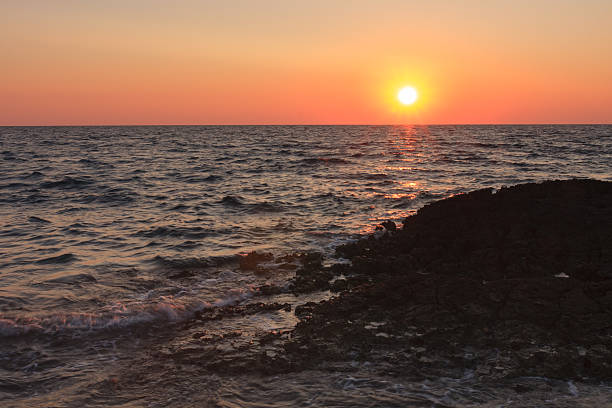 istock Sunset over the sea during summer evening in Croatia 508038030