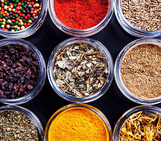 istock Spices on black background in special jars. Food 508038628