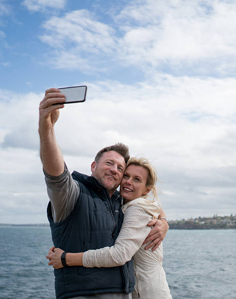 istock Loving couple taking a selfie at the beach 508039858