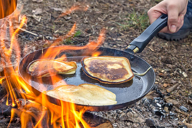 istock Cooking pancakes in the camp on open air 508039944