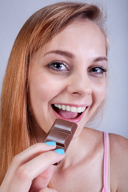 istock Skinny girl eats sweets 508049447