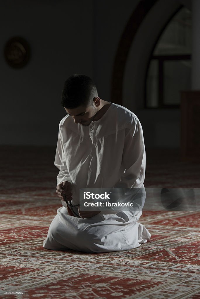 Enlightenment Young Muslim Man Making Traditional Prayer To God While Wearing A Traditional Cap Dishdasha Adult Stock Photo