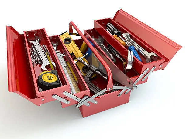 Photo of Toolbox with tools on white isolated background.