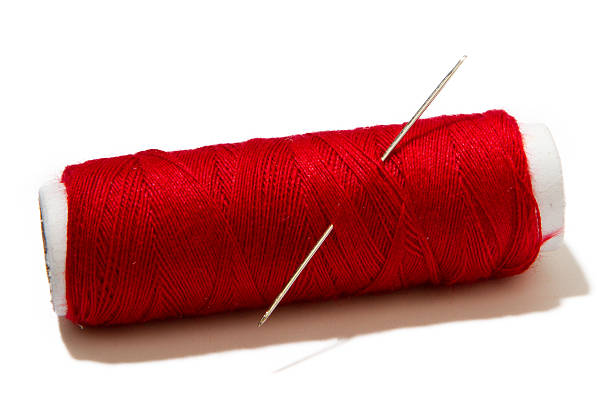 istock skein of red thread 508050823
