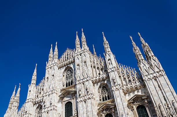 Milan - Duomo Bottom View of the Duomo - Milan - Italy cardinal clergy stock pictures, royalty-free photos & images