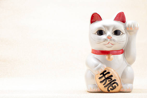istock Japanese beckoning cat also known as maneki neko 508051861
