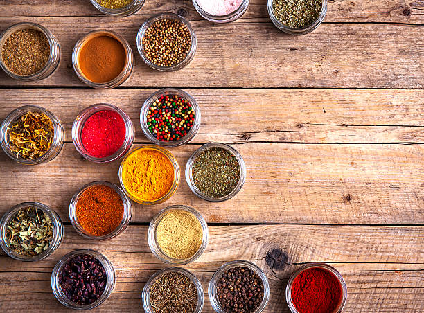 istock Spices in jars on wooden background. Food 508053708