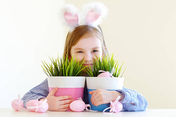 istock Adorable little girl wearing bunny ears on Easter 508055552