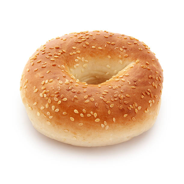 Bagel Sesame seeds bagel isolated on white (excluding the shadow) sesame bagel stock pictures, royalty-free photos & images