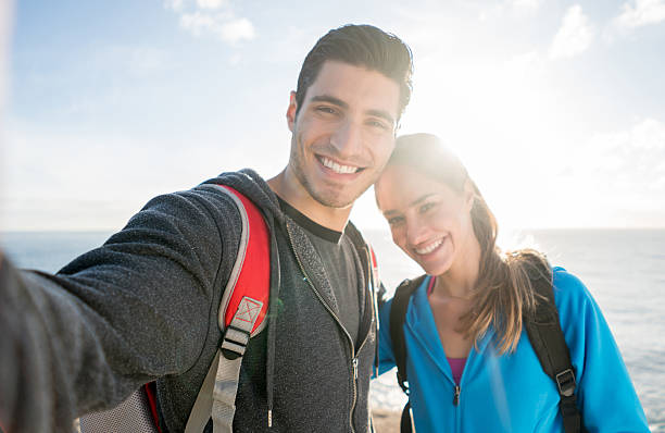 istock Hikers taking a selfie by the beach 508056104