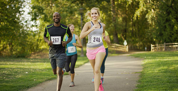 istock Group of runners running outdoors in a race 508056980
