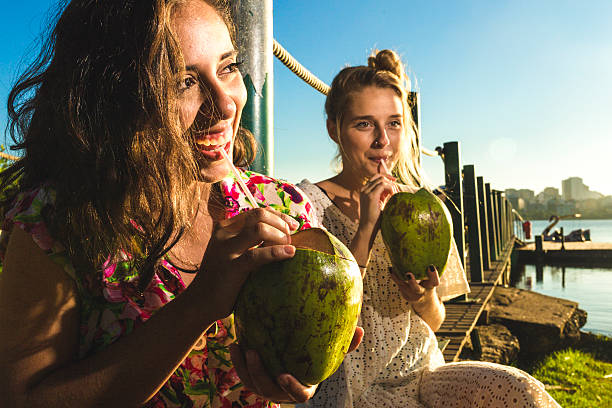 Exotic cocktail in coconut with rum and coconut milk
