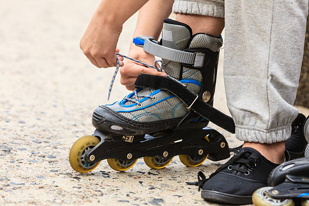 istock Woman putting on roller skates outdoor. 508058516