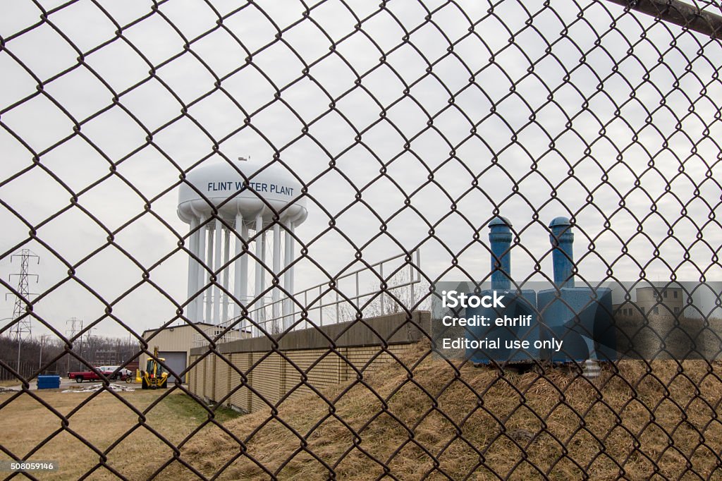 Flint Michigan agua de cadena cerca de conexión de torre - Foto de stock de Flint - Michigan libre de derechos